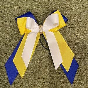 Hair bow in blue and yellow! Handmade. Brand new.